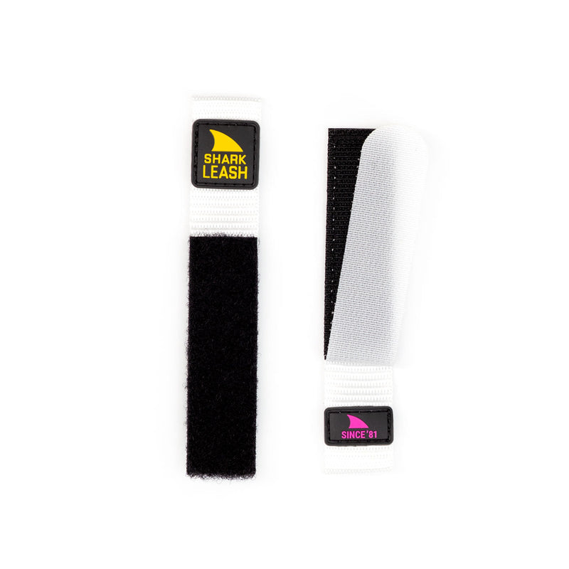 Two black and white Freestyle STRAP KIT - LEASH - SINCE 81 NEON NIGHT straps featuring a distinctive leash closure.