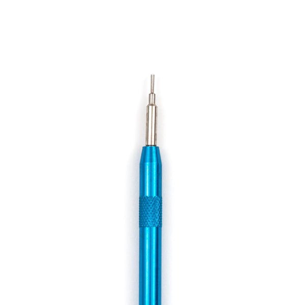 Close-up of Freestyle Shark Tools Strap Tool with a blue handle and thin, pointed metallic tip on a white background.