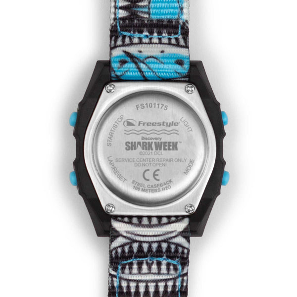 Back of Freestyle SHARK MINI CLIP SHARK WEEK MEGA GRIN watch featuring a patterned band, metal case, and engraved details.
