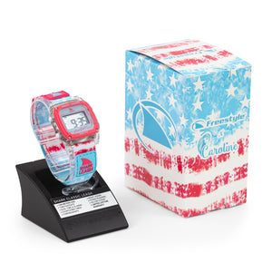 The Freestyle CAROLINE MARKS SIGNATURE SHARK CLASSIC LEASH SURFIN USA features a red, white, and blue strap and comes with a box.